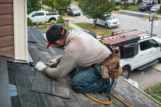 Professional Storm Damage Roof Repair technician working in Kingston, WI